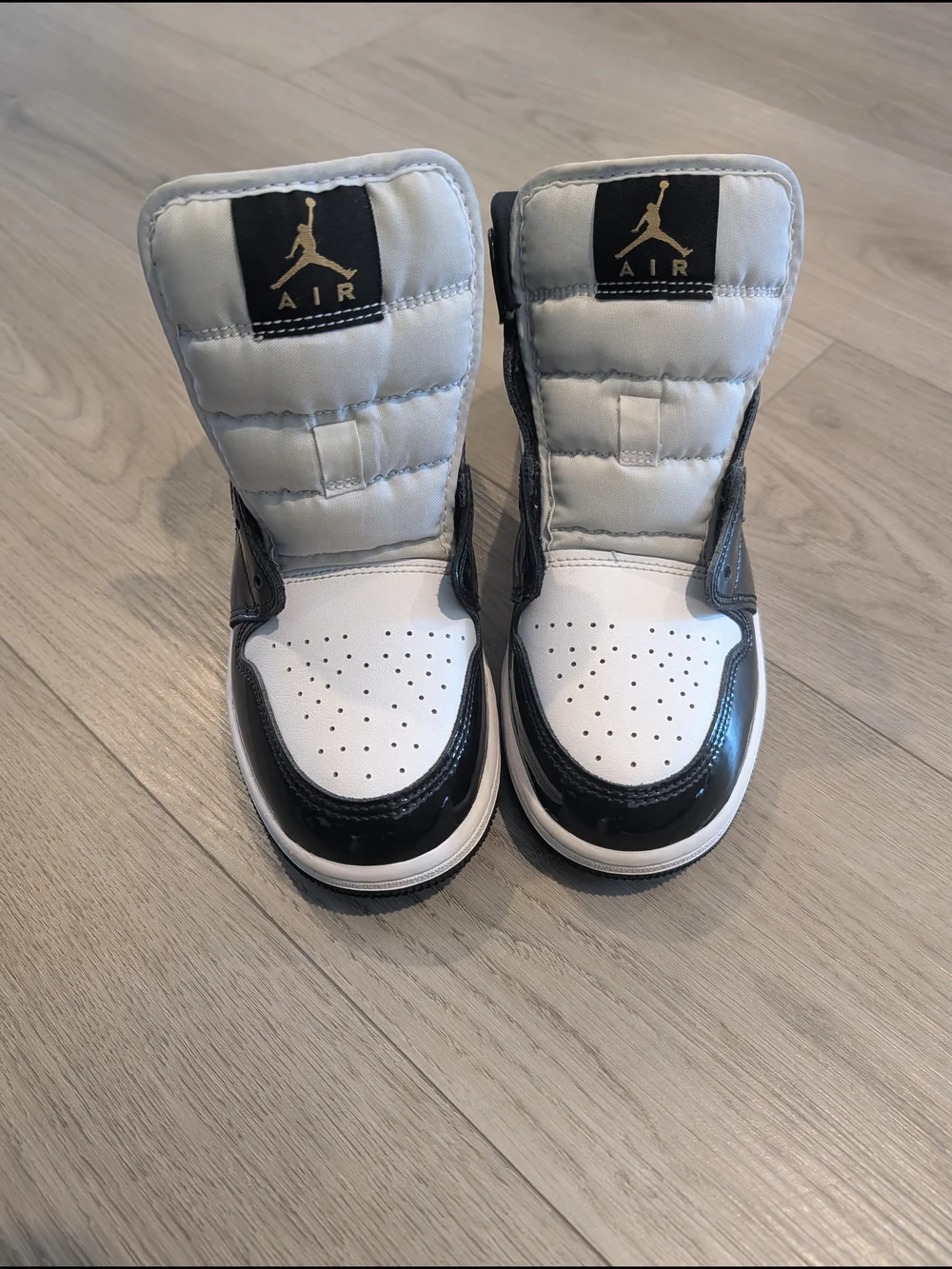 Jordan Kids High-Top Sneakers in White, Black, and Gold